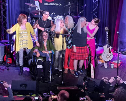 Fanny taking a final bow before an enthusiastic crowd. A lot of press photographers were there and you can see them squished up against the stage.