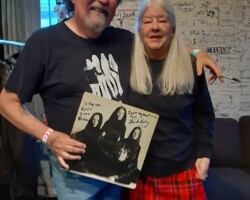 Yours truly with drummer Alice de Buhr. Alice and I have been friends for over 20 years now. I brought an original album cover to have the band members autograph for me.