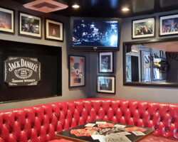 One of the VIP tables. They had an excellent Closed-Circuit TV set up so if you sat in the back, you still could see the band.