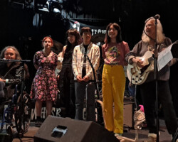 The all-girl rock group the Linda Lindas joined Fanny onstage during the sound check. They would sing on "When We Need Her" and on "Charity Ball".